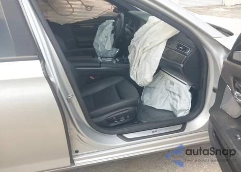 2014 BMW 740Li из США, поврежденный, VIN WBAYE4C58ED138126